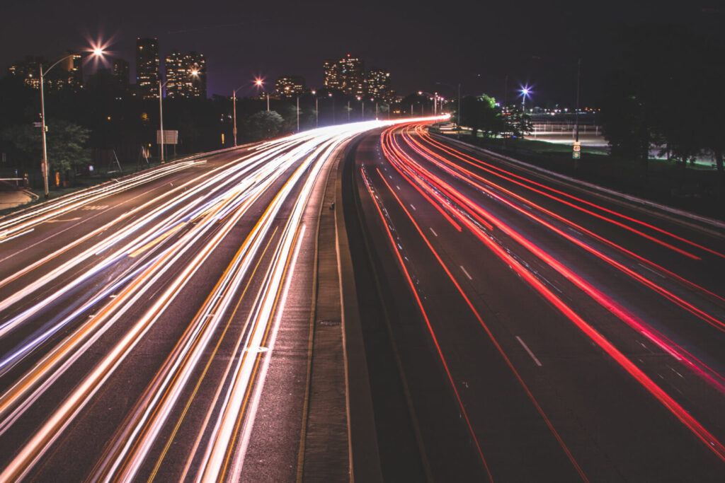Long exposure headlights and taillights on busy road at night