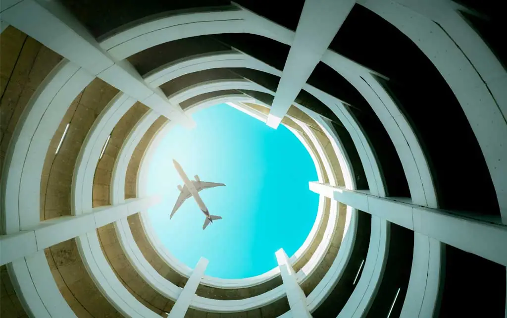 An airport parking lot that optimizes revenue and operational efficiency by utilizing airport parking dynamic pricing.