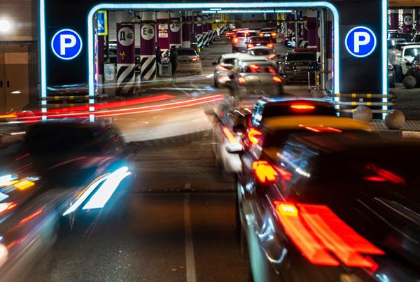 An airport parking lot uses parking management software that is integrated with multiple systems to enable dynamic pricing.